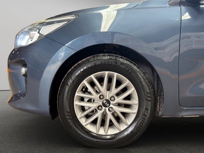 2018 Kia Rio 4 pts. EX, TM6, a/ac. Aut., VE, f. niebla, RA-15 (línea nueva)