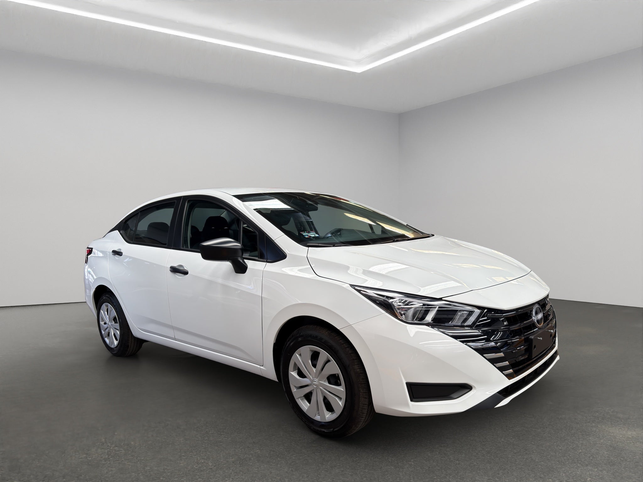 2024 Nissan Versa 4 pts. Sense, TM5, a/ac., R-15