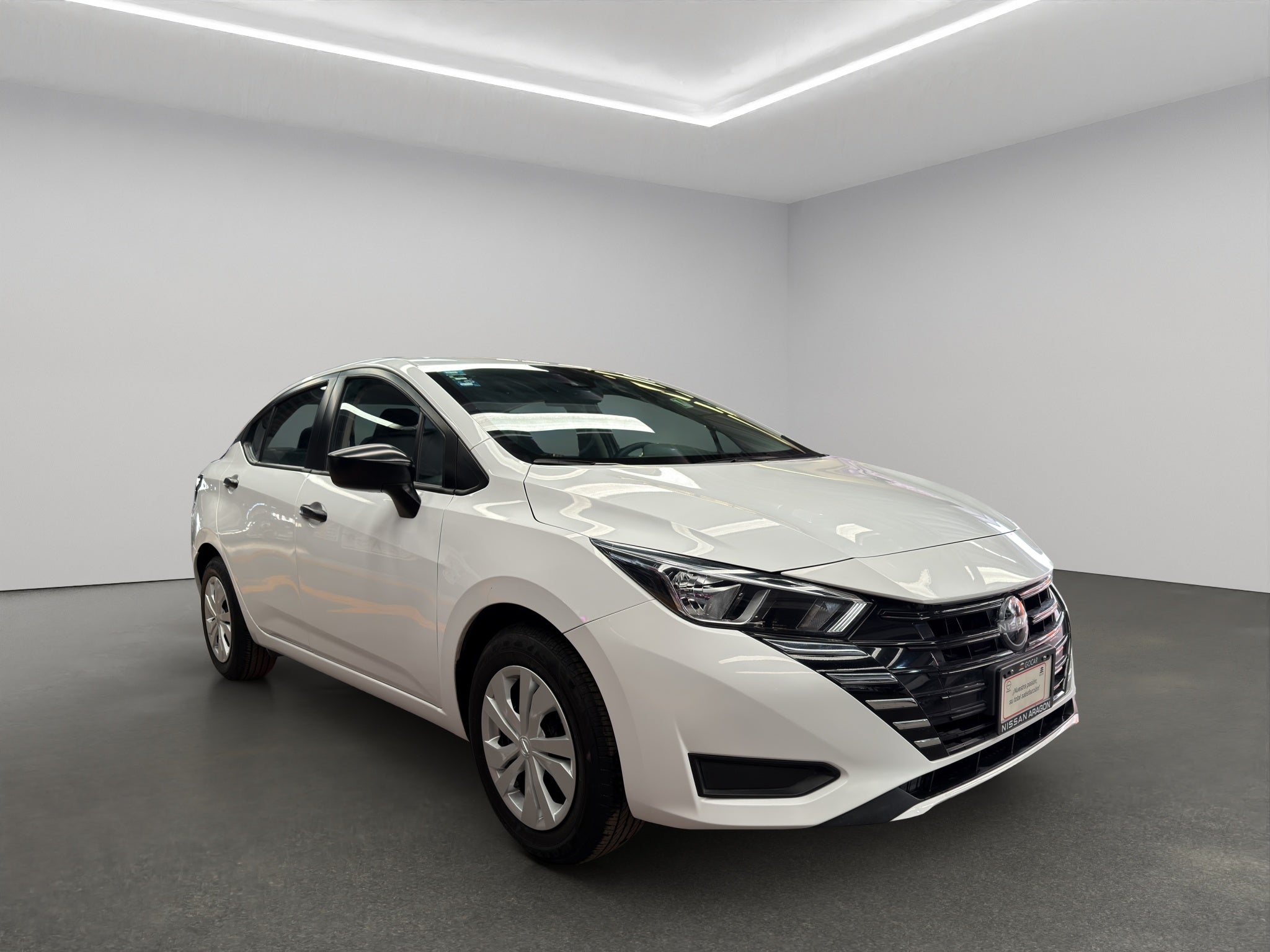 2024 Nissan Versa 4 pts. Sense, TM5, a/ac., R-15