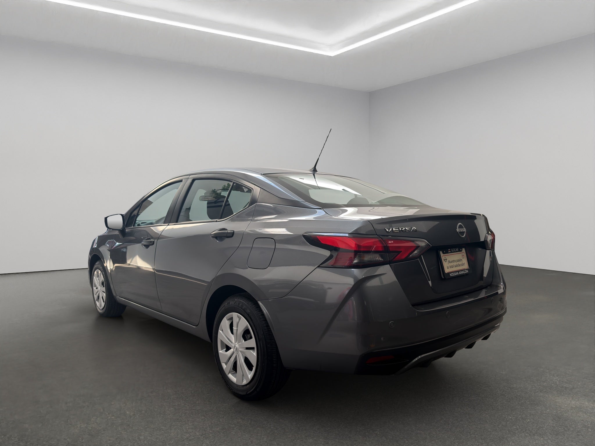 2024 Nissan Versa 4 pts. Sense, TM5, a/ac., R-15