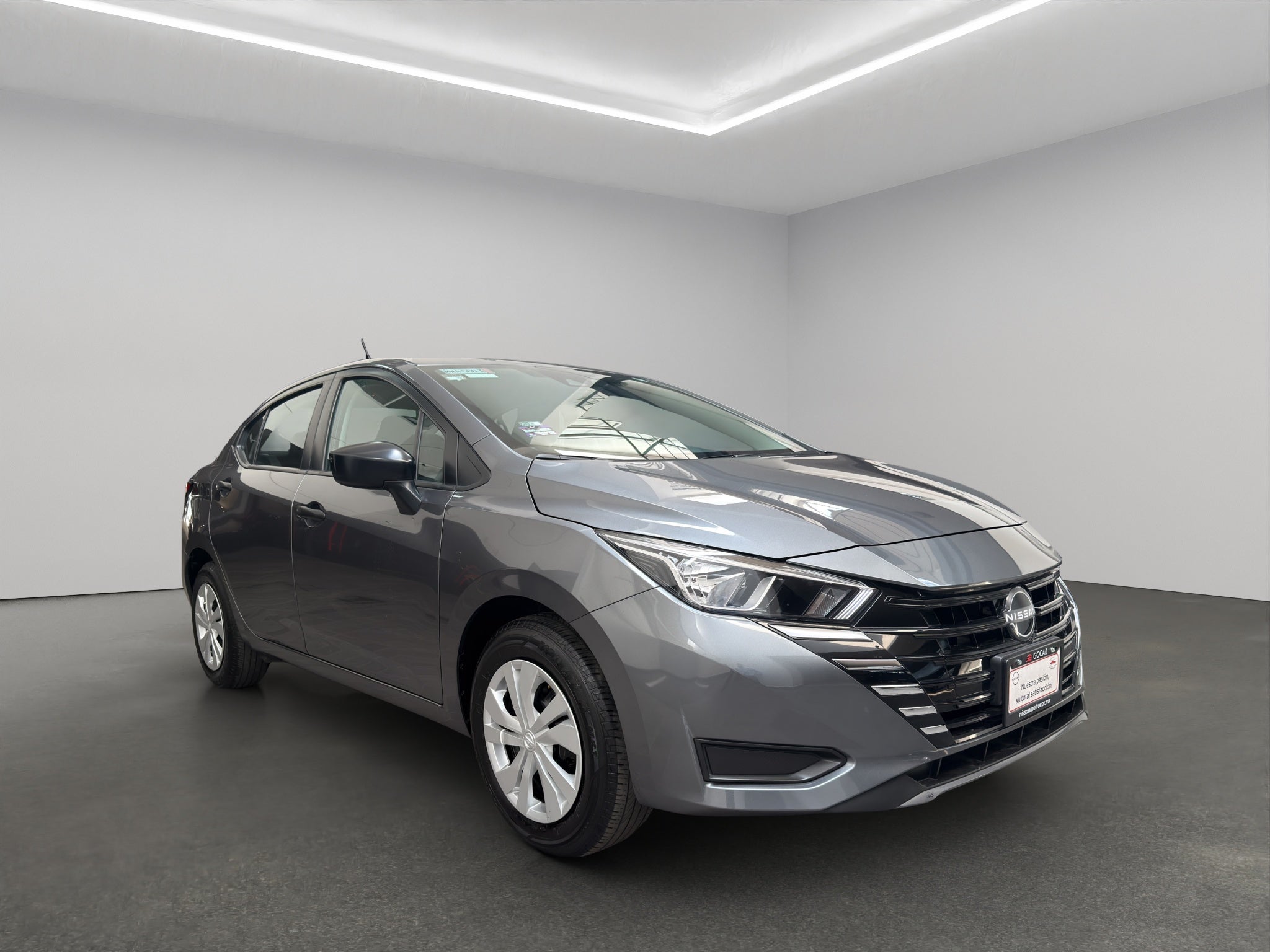 2024 Nissan Versa 4 pts. Sense, TM5, a/ac., R-15