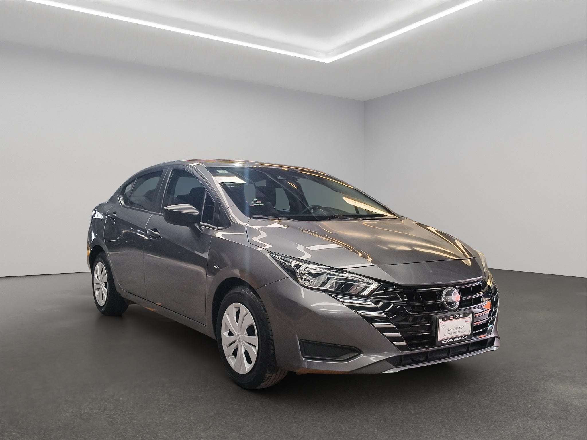 2024 Nissan Versa 4 pts. Sense, TM5, a/ac., R-15