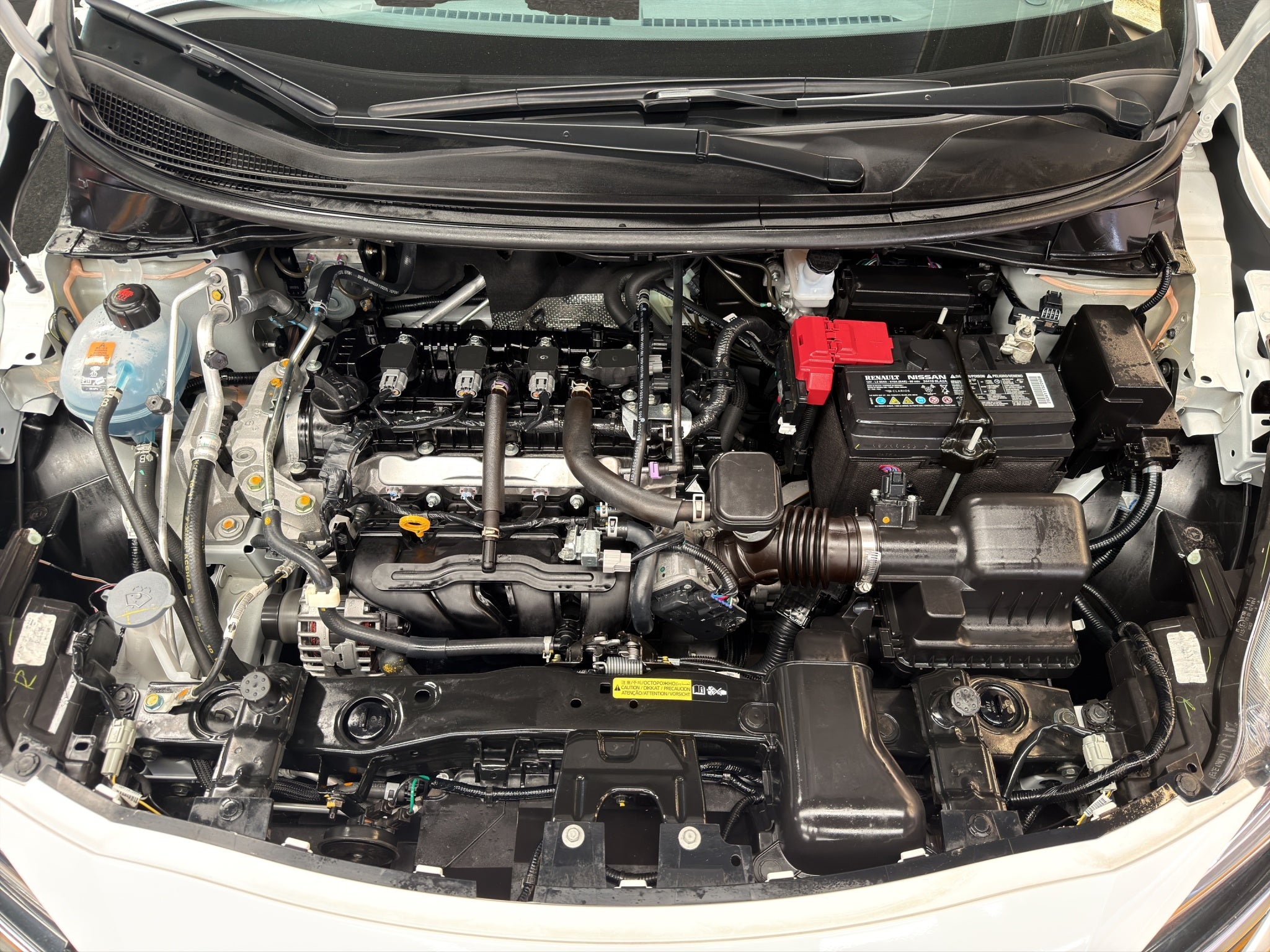 2024 Nissan Versa 4 pts. Sense, TM5, a/ac., R-15