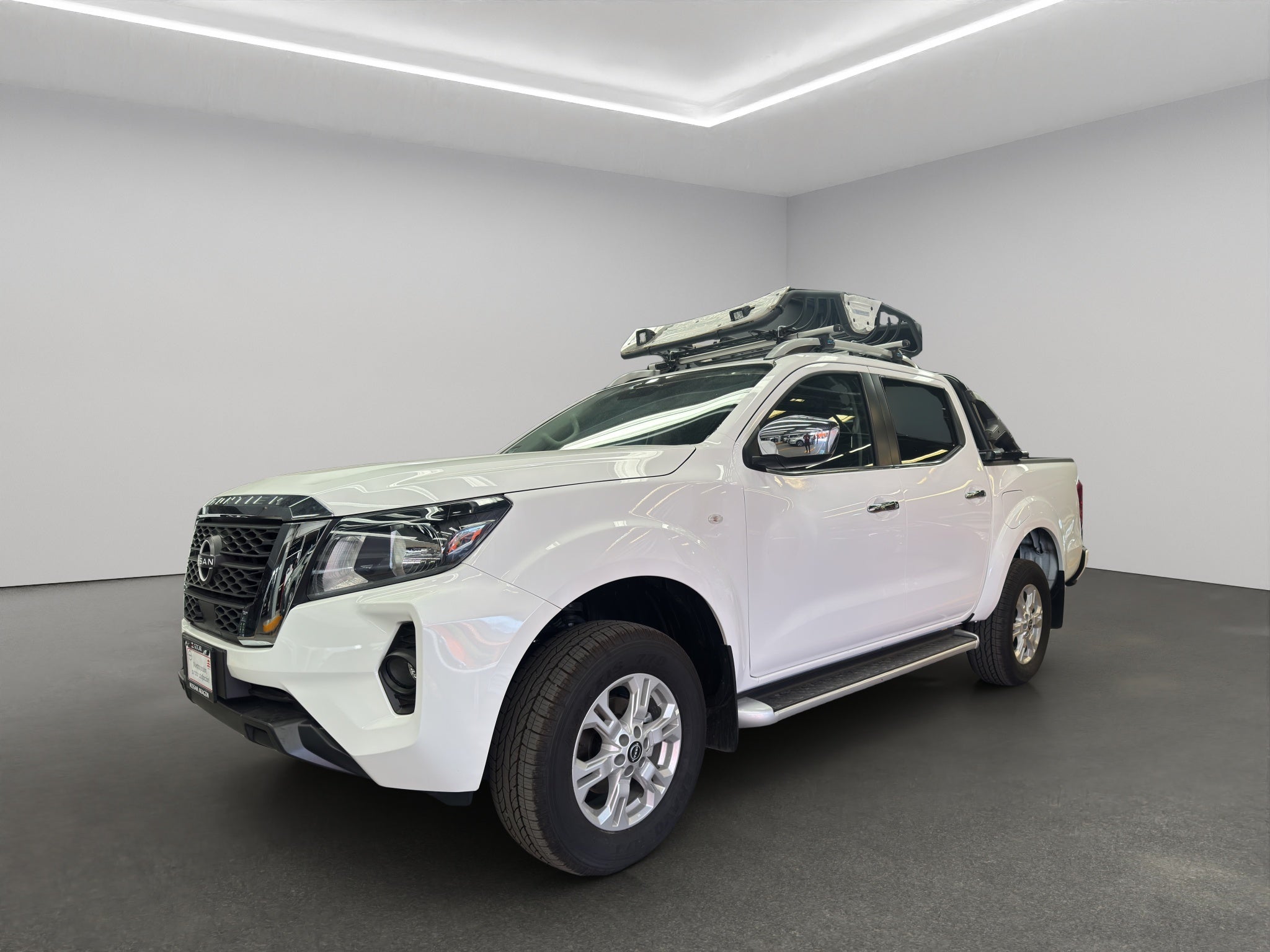 2025 Nissan Comerciales Frontier y NP 300 Frontier Pick-Up 4 pts. Frontier LE, Doble Cab., L4, 2.5l, TM6, a/ac., VE, estribos, RA-17